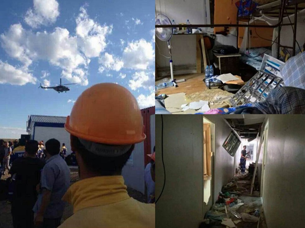网络披露的照片显示大批中国人聚焦在一起和被打砸的房屋